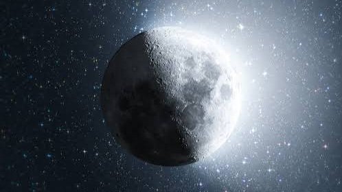 High-resolution view of the Moon against a dense, starry background in deep space.