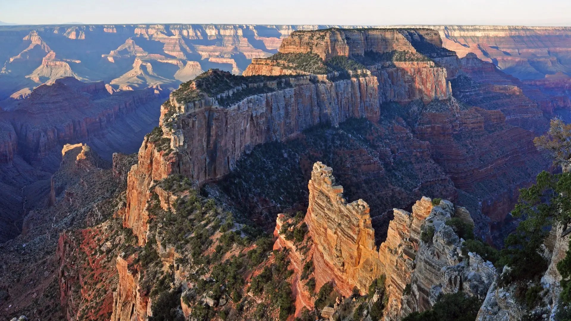 View of the Grand Canyon rock formations and steep valleys in Arizona, United States.