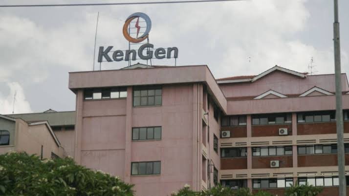 Exterior view of the Kenya Electricity Generating Company corporate headquarters building showing the company sign against a daytime sky.