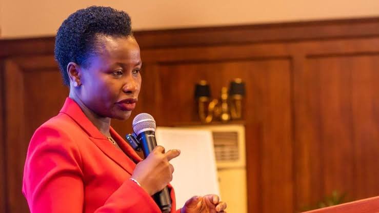 Susan Mang'eni, Principal Secretary for MSMEs Development, speaking at a podium with a microphone.