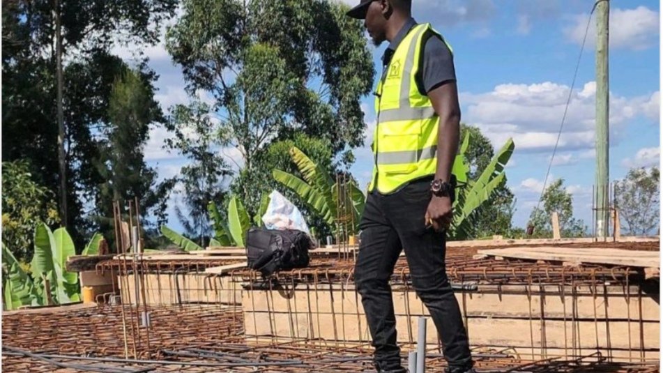 A construction professional wearing a safety vest stands outdoors, with text from a LinkedIn post about the necessity of contracts visible above the image.