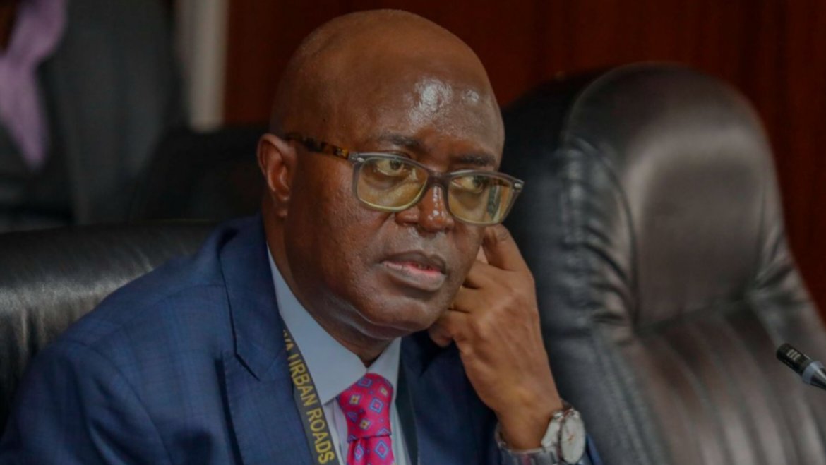 Kenya Urban Roads Authority Director General Silas Kinoti seated during a formal briefing.
