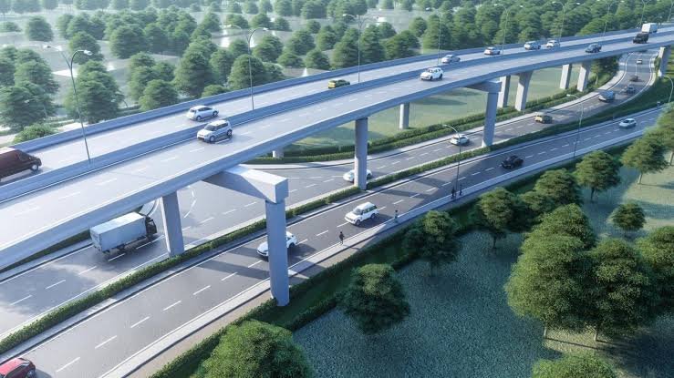 Aerial 3D architectural rendering showing a modern multi-lane highway interchange with surrounding green spaces and urban infrastructure in Kenya.