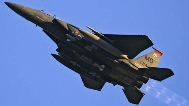 Fighter jet in flight, illustrating pilot ejection safety systems