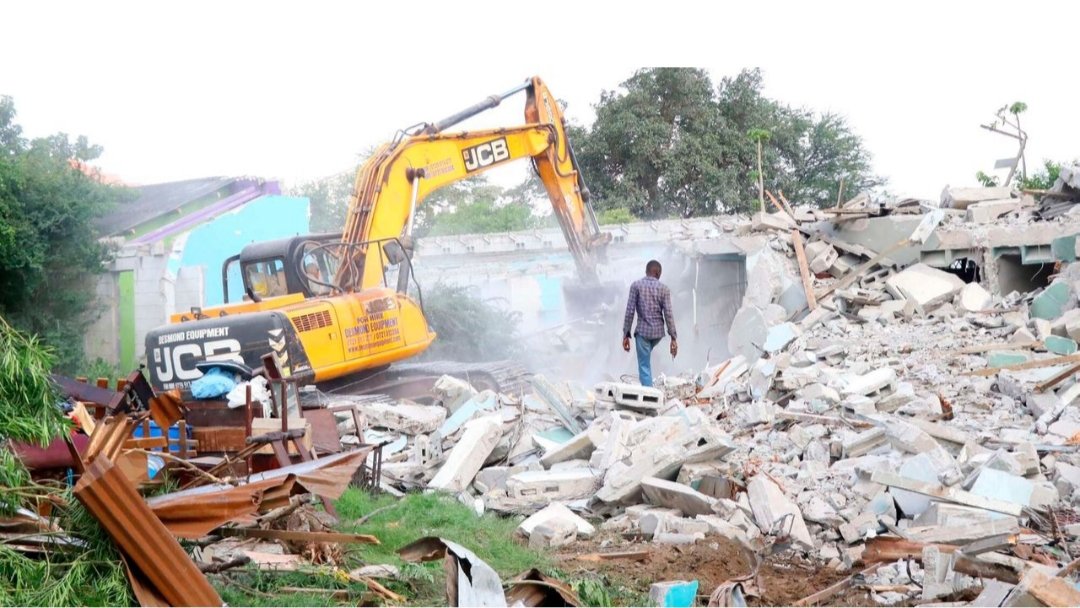 Bulldozer demolishing houses in Changamwe National Housing Corporation Estate in Mombasa