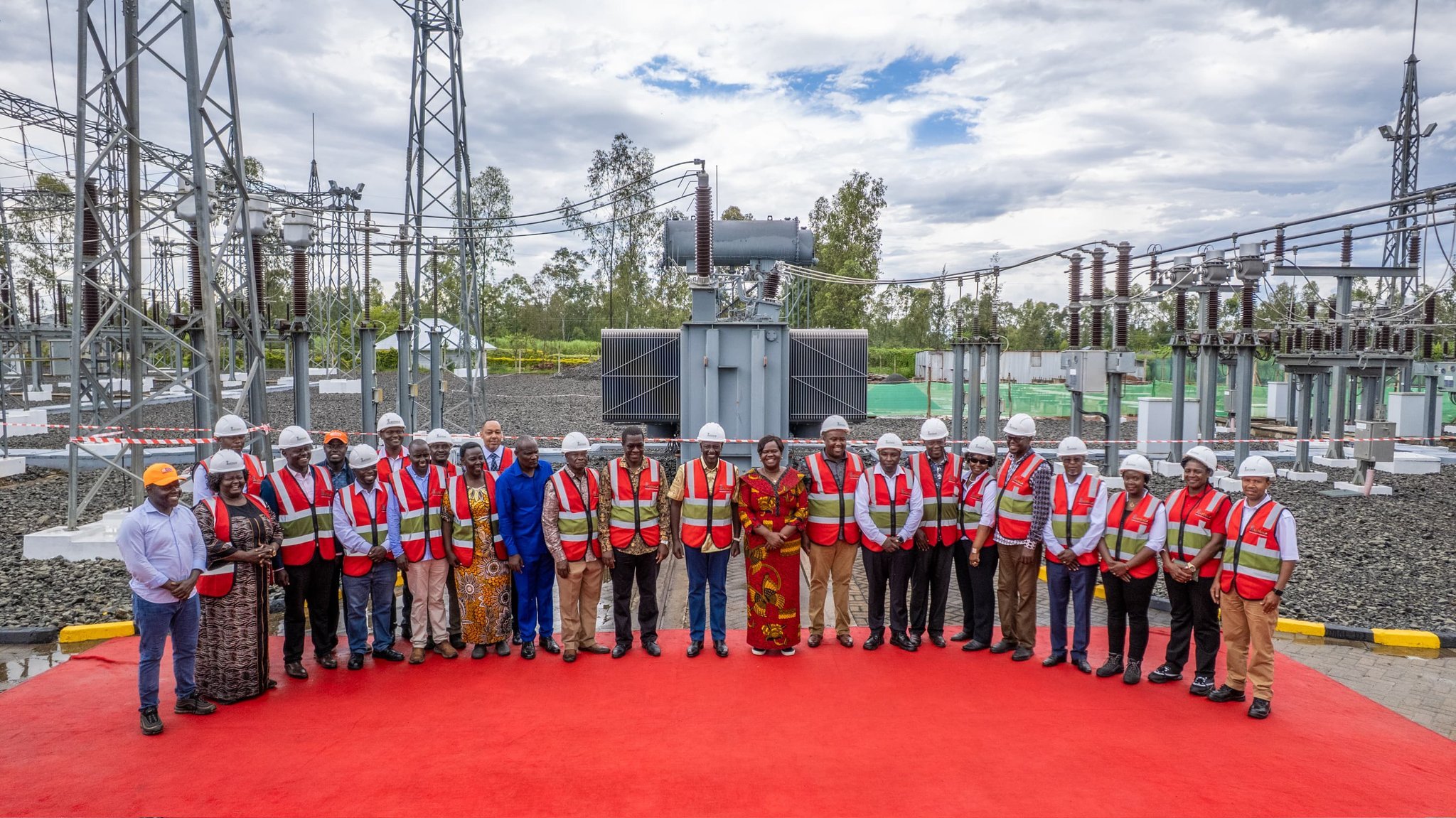 A wide-angle view of the newly commissioned 132kV electrical substation in Homa Bay County, showing the transformer units and steel gantry structures against a rural landscape.