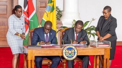 President William Ruto (left) looks on as Prime Cabinet Secretary Musalia Mudavadi and Governor Johnson Sakaja sign the Sh80 billion cooperation agreement at State House, February 17, 2026.