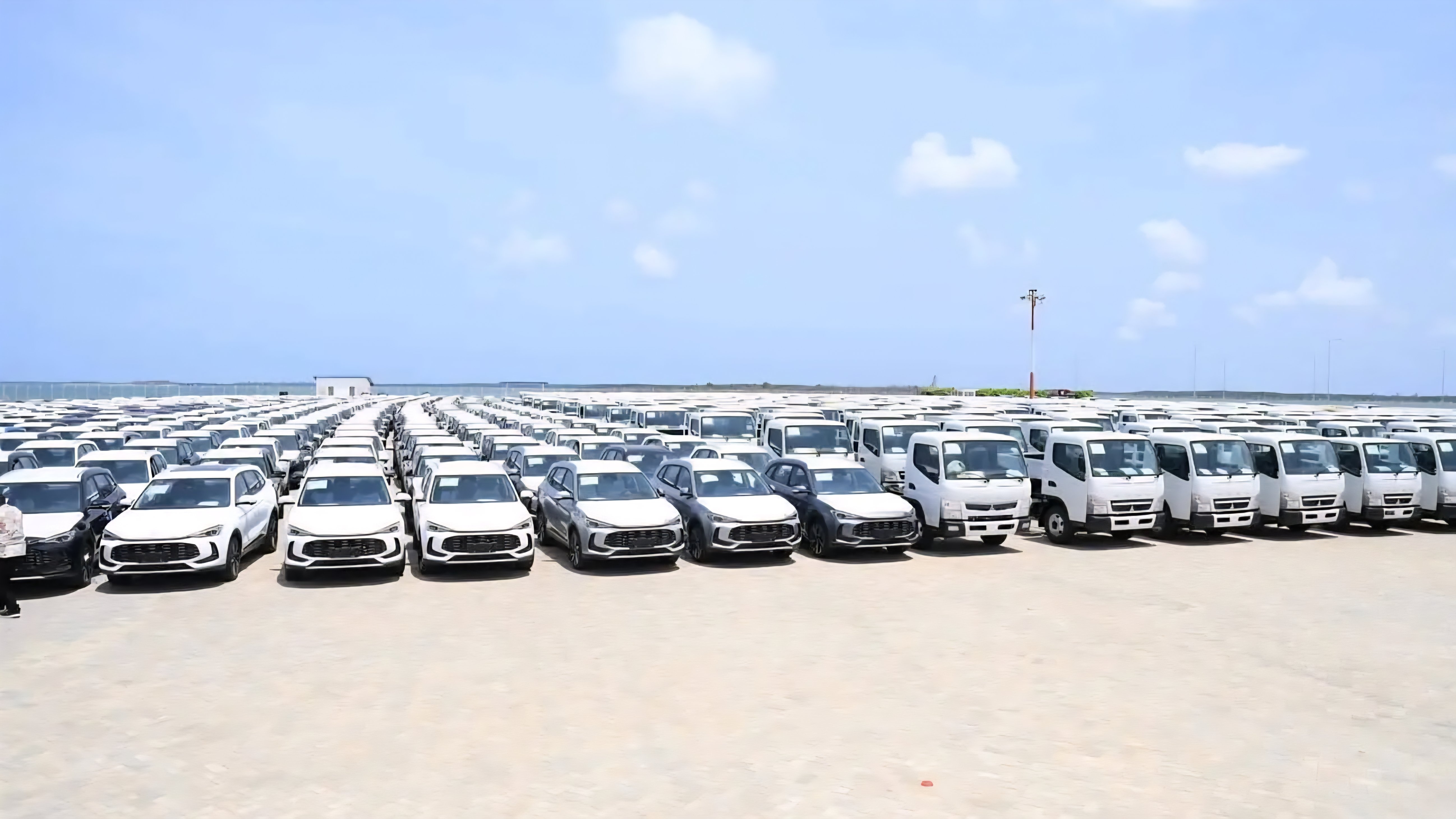 Rows of imported second-hand motor vehicles parked at a shipping terminal at the Port of Mombasa, Kenya.