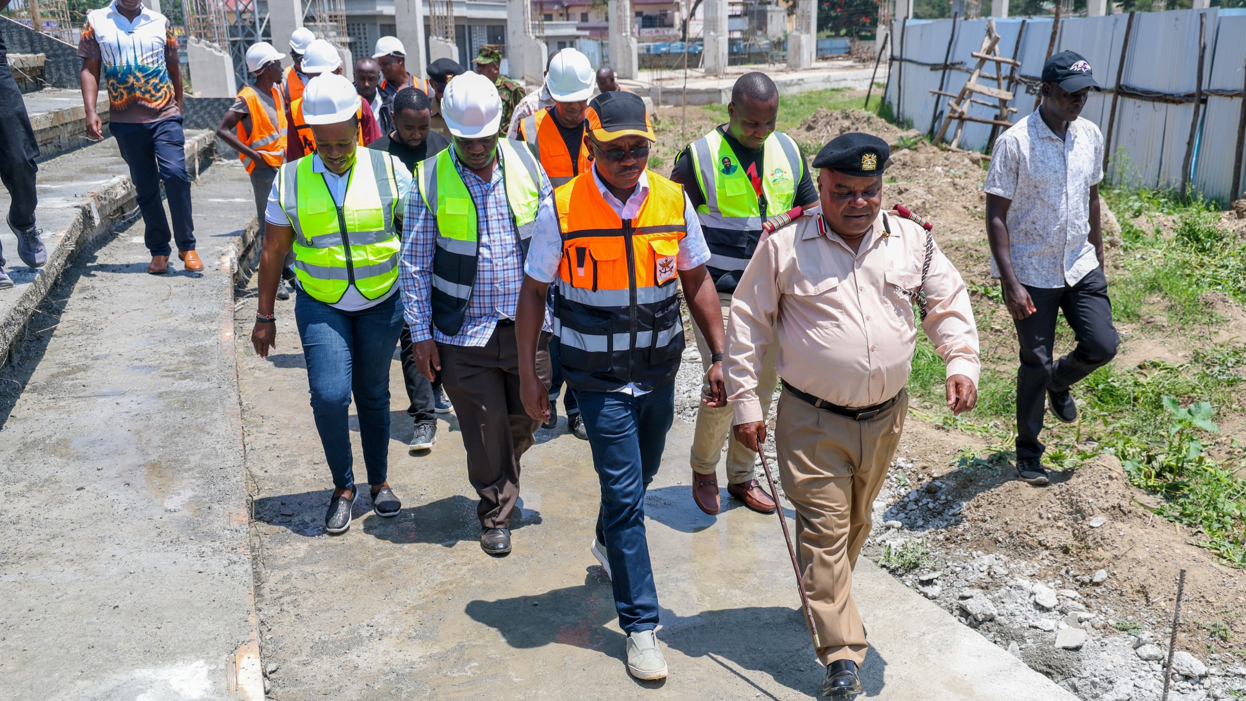 Defense Principal Secretary Dr Patrick Mariru inspecting ongoing construction works at Afraha Stadium in Nakuru County alongside local officials.