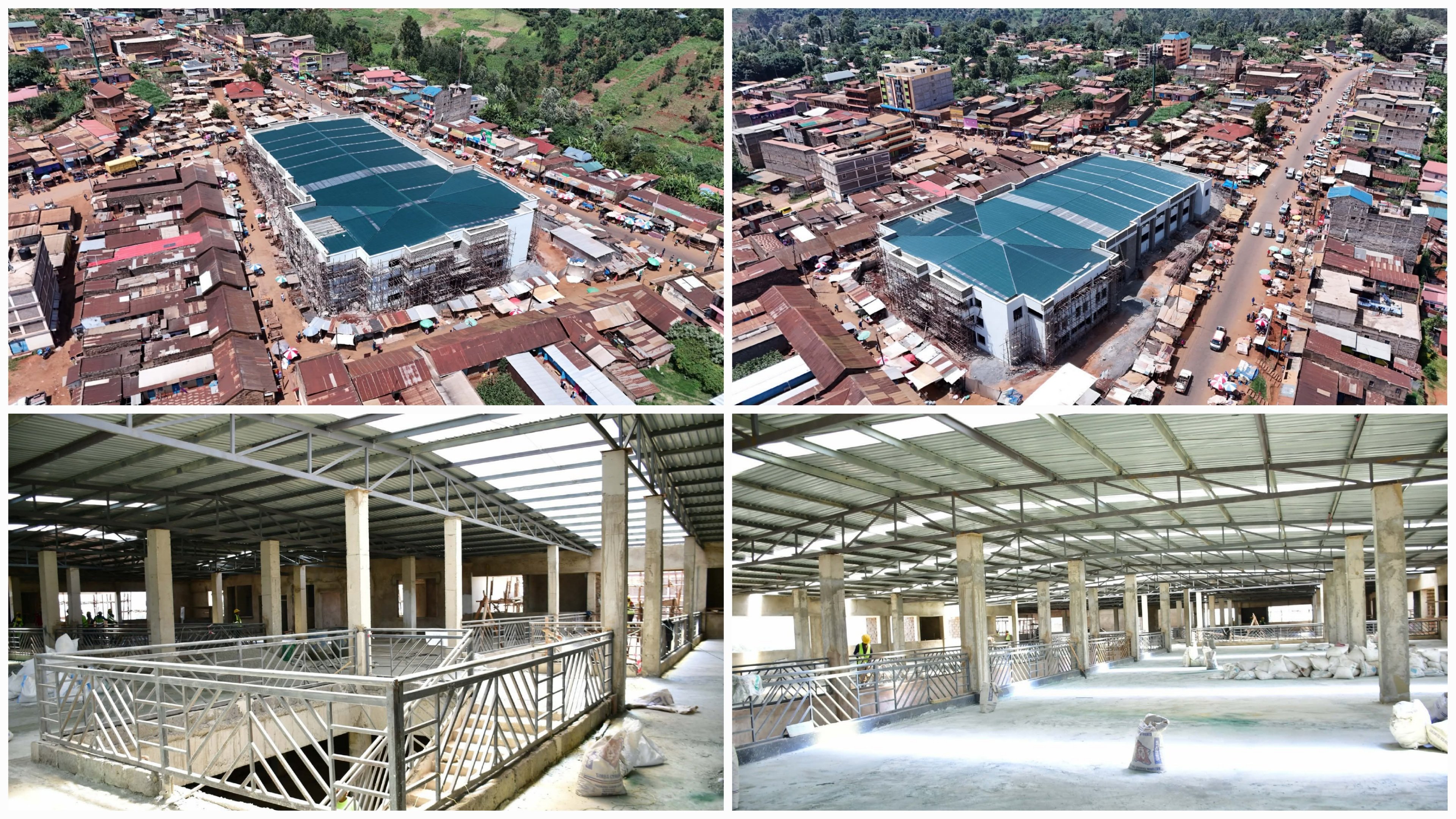 Construction workers finishing the exterior and metal staircases of a multi-storey concrete market building in Kamwangi, Kenya.
