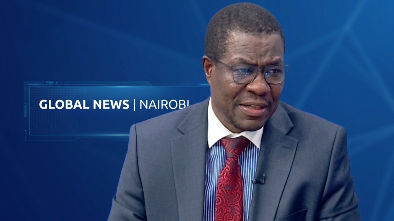 Energy and Petroleum Cabinet Secretary Opiyo Wandayi seated at his desk during a formal address.