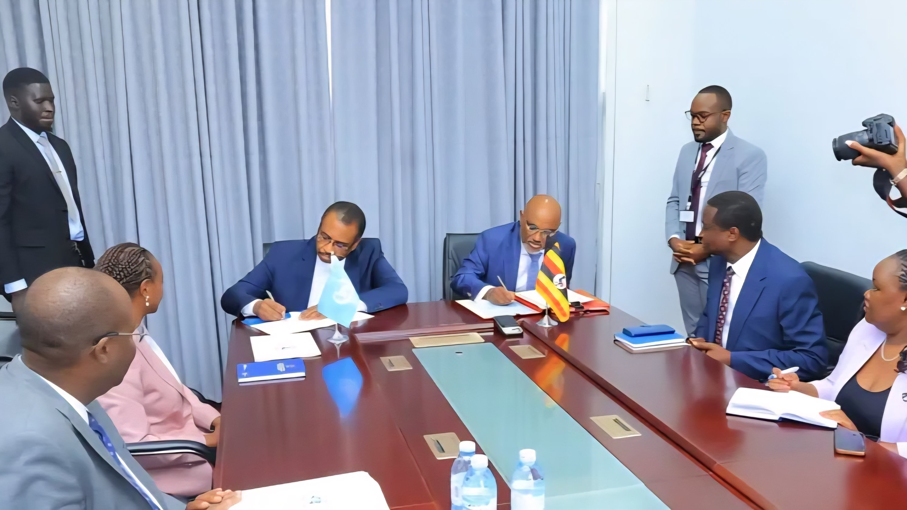 Delegates signing the Host Country Agreement at the Ministry of Foreign Affairs headquarters in Kampala, Uganda.