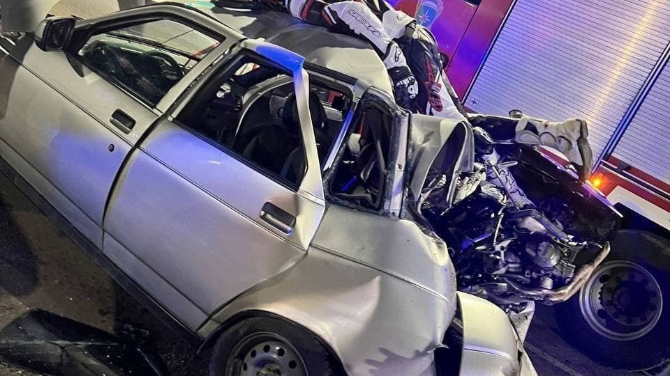 The scene of the aftermath of a recent high speed bike crash into a stationary car