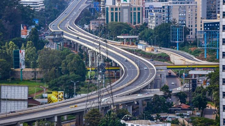 Elevated view of a modern expressway in Nairobi at dusk, symbolizing Kenya's high-cost infrastructure projects and their associated financial liabilities.