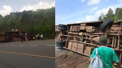 Climax Coaches bus lying on its side after overturning on the Nakuru-Eldoret Highway at Chepsir, Kericho County, with injured passengers visible on the roadside.