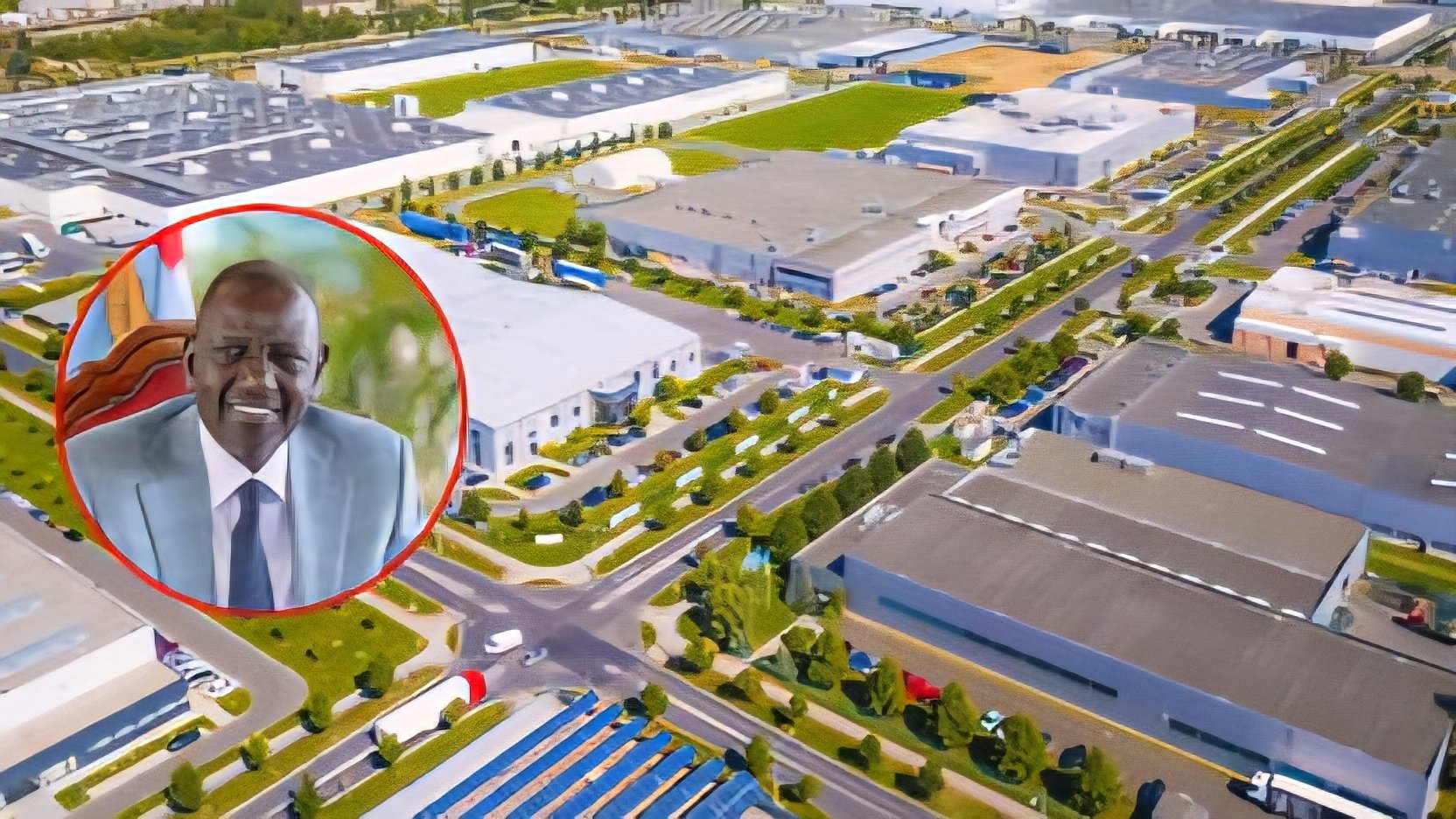 An aerial perspective of an expansive manufacturing zone featuring rows of long industrial warehouses, access roads, and an inset photograph of President William Ruto.