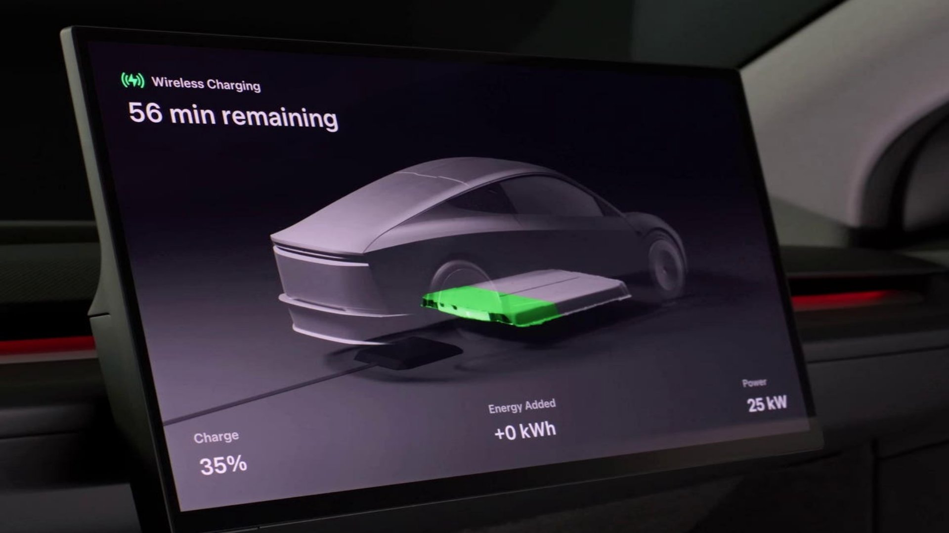 A top-down view of a Tesla car aligning with a wireless charging pad.