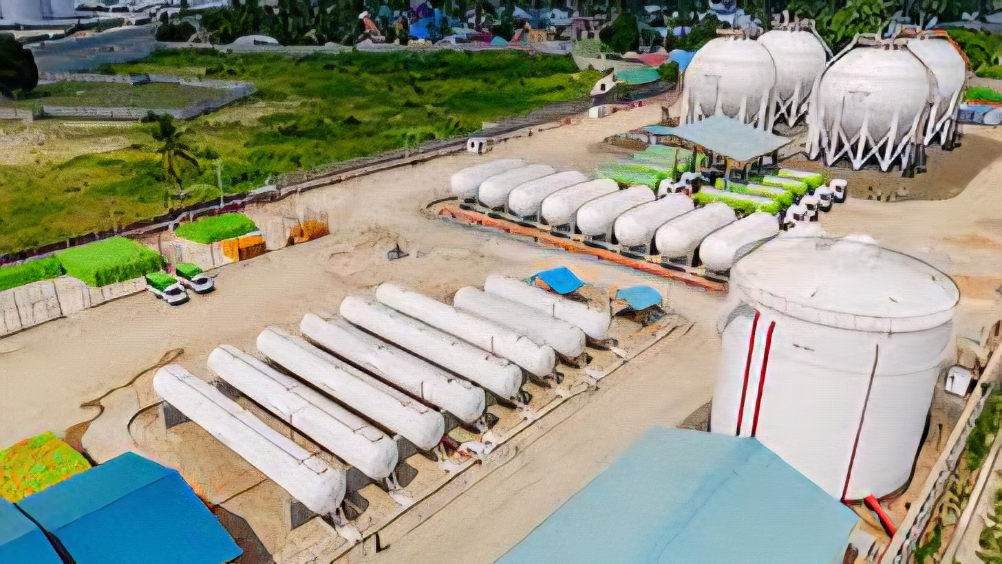 Large white spherical and cylindrical LPG storage tanks under construction at the Taifa Gas terminal site in Dongo Kundu, Mombasa.